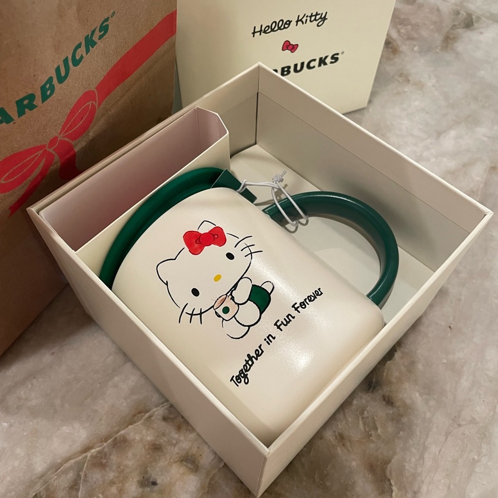 Starbucks Hello Kitty Mug with Green Handle